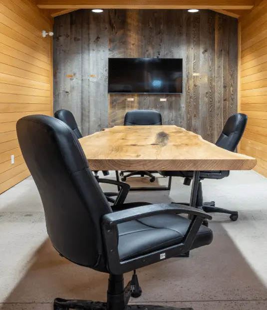 live edge table in show room with tv